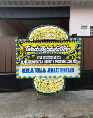 Papan Bunga Duka di Nainggolan